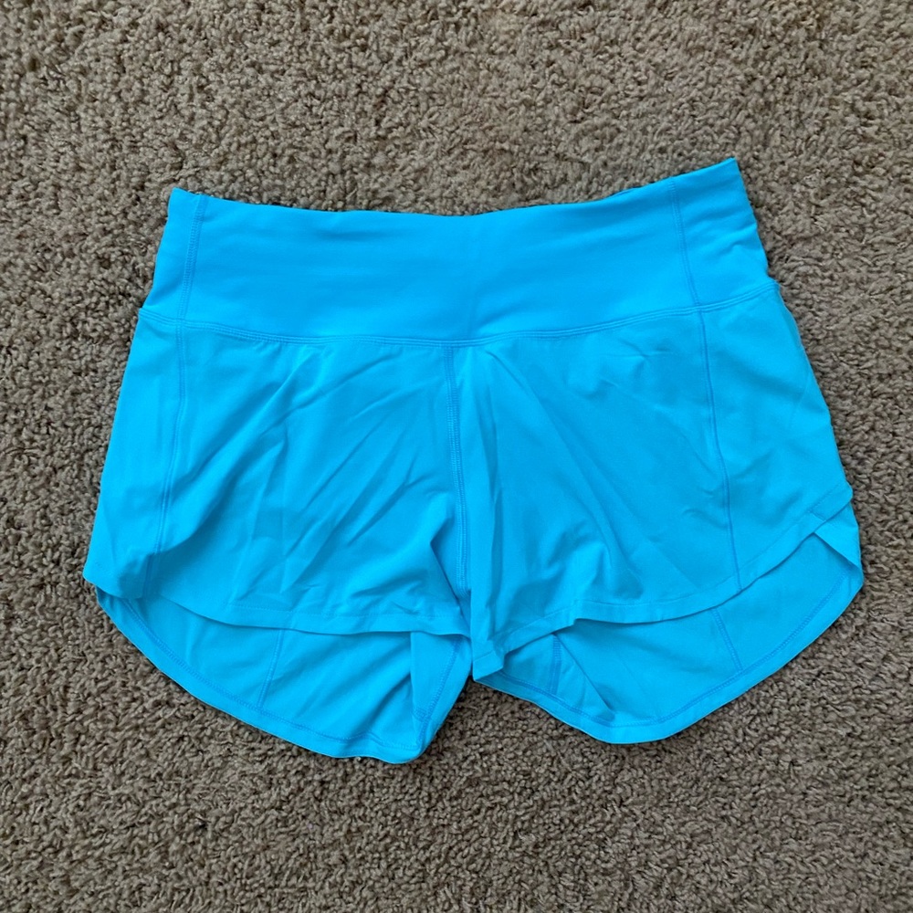 lululemon Speed Up Mid-Rise Lined Short 4" in Electric Turquoise